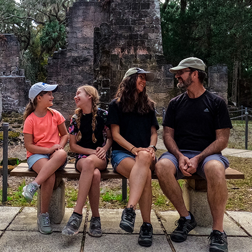 The Cohns on a bench a Bulow Plantation Ruins Historic State Park